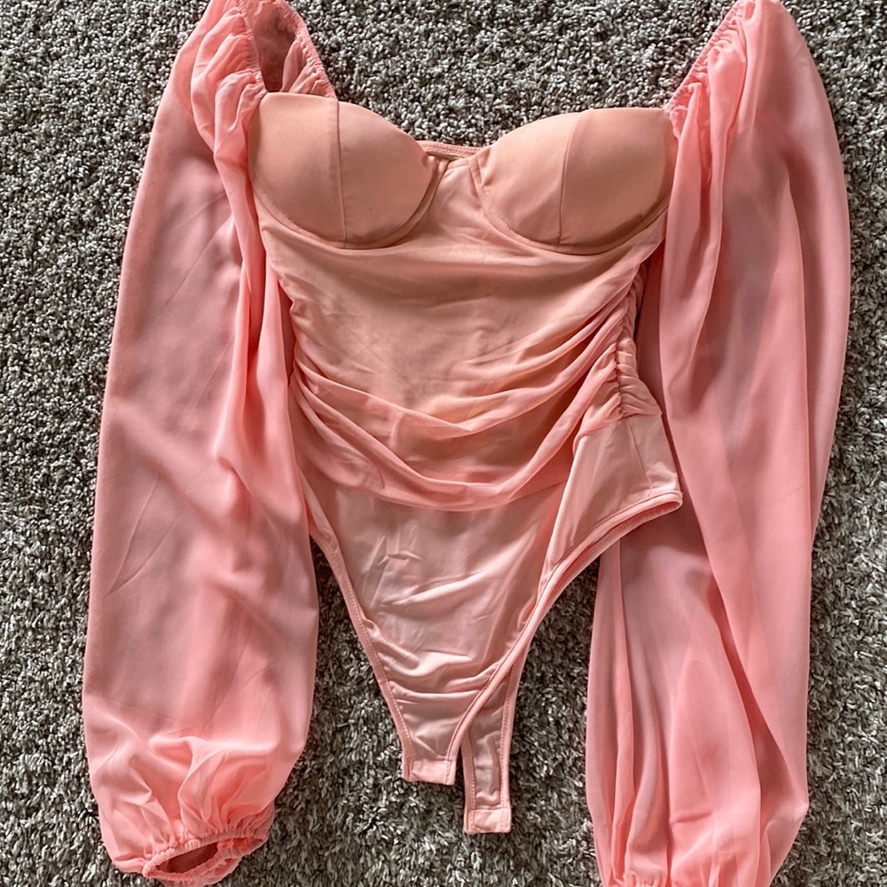 Pink body suit